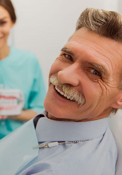 DENTAL IMPLANTS & DENTURES
